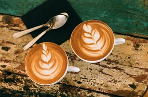 Photo of two coffee mugs with coffee